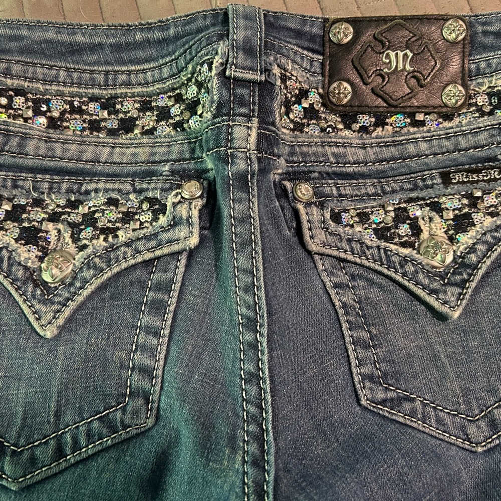 SOLD Miss Me Jeans with stud, rhinestone, and sequin- Signature Boot Size 28